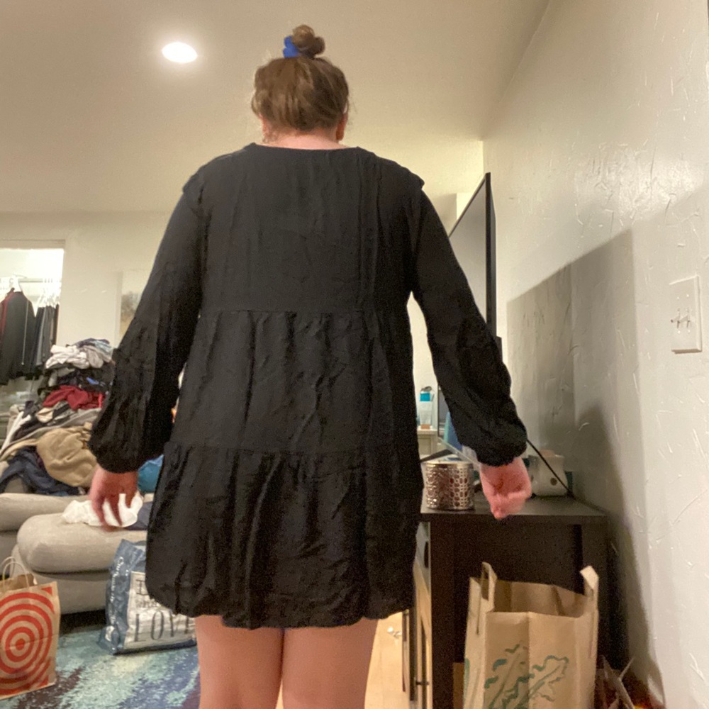 Long sleeve black knee length dress